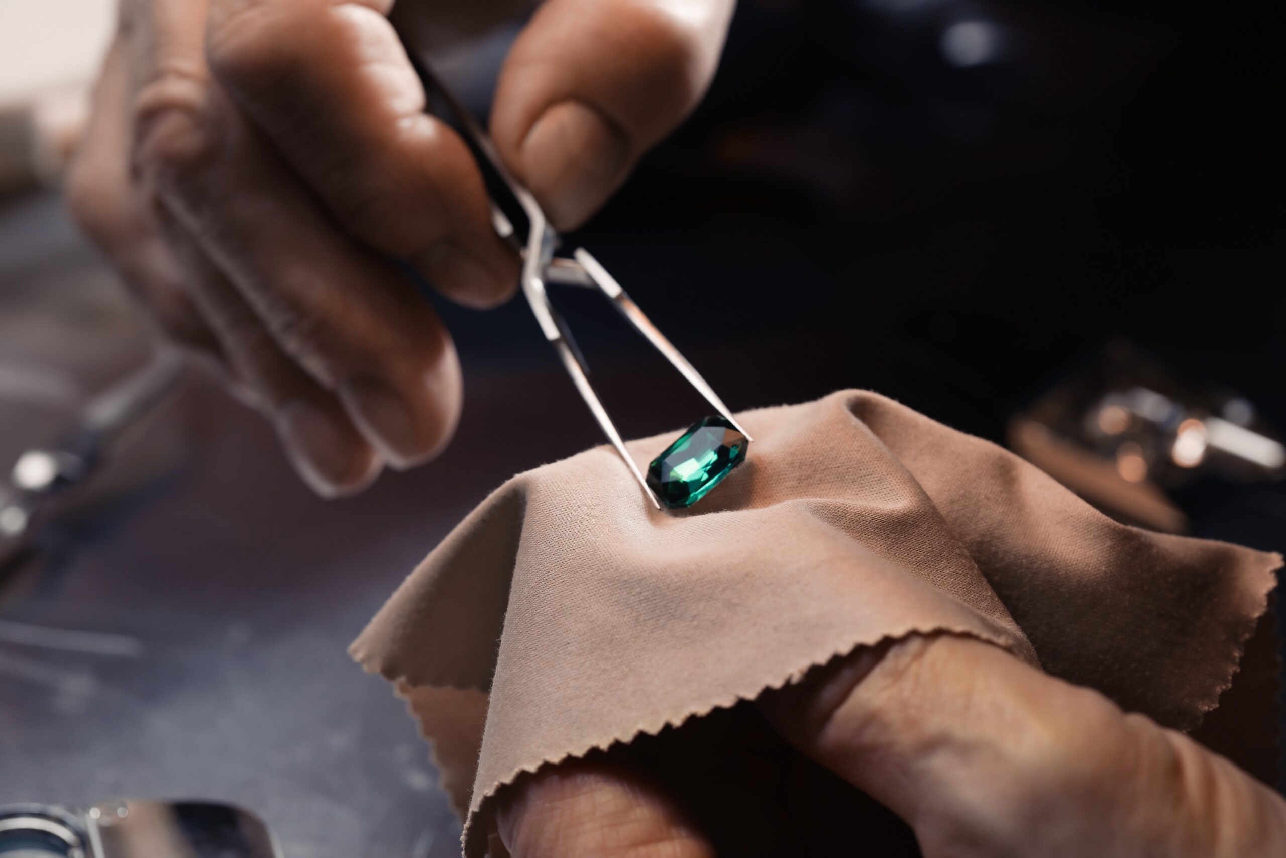 Professional,Jeweler,Working,With,Gemstone,,Closeup,View